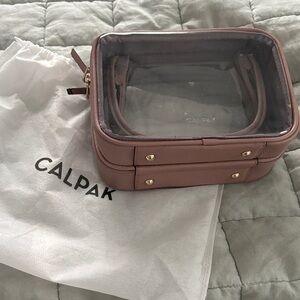 Calpak Mauve Clear Cosmetic Case